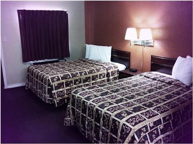 Deluxe Inn Stamford Номер фото